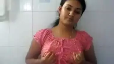 Cute girl playing in bathroom