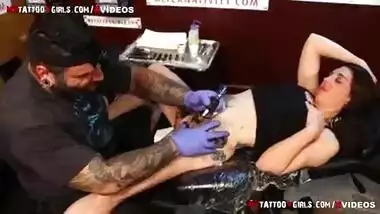 Girl Getting Tattoo Around Shaved Pussy