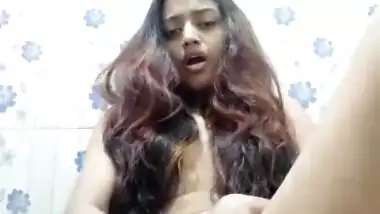 Indian girl moaning hard while dildoing