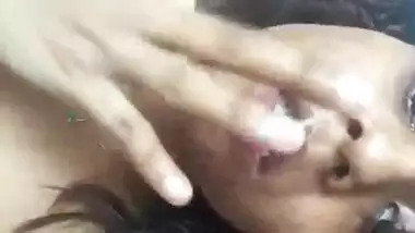 Indian girl tastes pussy juice while she masturbates her cunt
