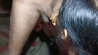 Slim Desi bhabhi gets on the knees to suck uncut XXX pecker well