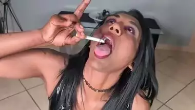 Indian girl smoking 2 cigarettes and useing herself as an ashtray | PVC clothing