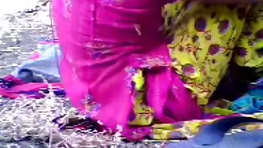 A desi husband fucks his wife outdoors in a bushes