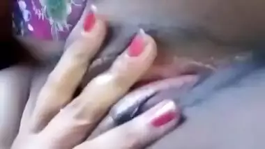Beautiful horny Indian Bhabhi fingering her cunt