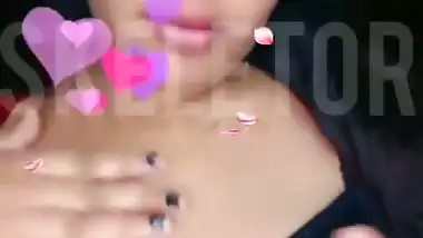 Telugu girl topless sucking her own big boobs MMS