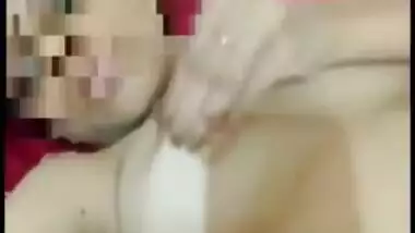 Desi girl exposes XXX boobies and pinches brown nipples holding camera