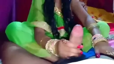 Desi in green dress gives XXX partner a handjob before pussyfuck