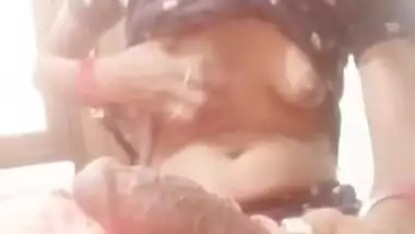 Slim Bhabhi showing boobs holding dick on hand