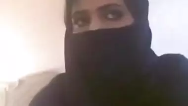 Pretty Desi beauty in hijab demonstrates massive XXX jugs on camera