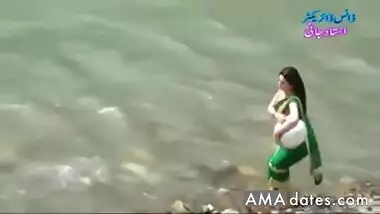 Desi girl in transparent wet saree showing boobs..hot show