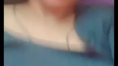 Bhabhi in glasses goes naked and fingers cunt