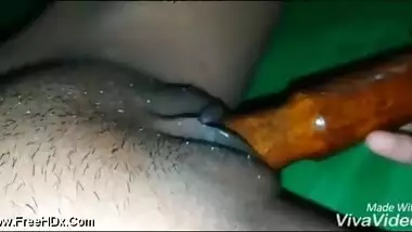 Indian MILF plays sex games with a XXX rolling pin in her sex hole