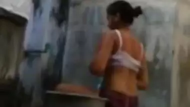 India girl bathing