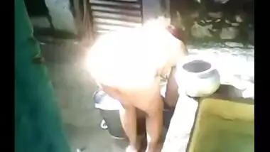 Desi big ass aunty outdoor bath captured by neighbor