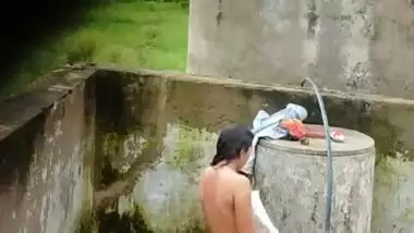 Indian Village Girl Bathing Near Water Tank Outdoor