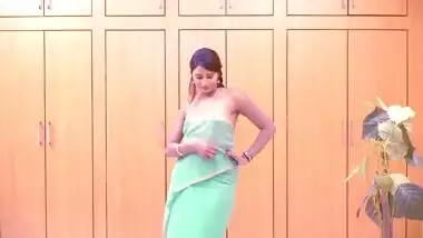 Indian actress Swathi Naidu looks very sexy wearing a turquoise dress