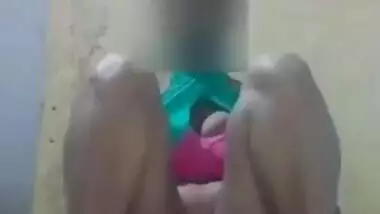 Slutty Desi chick hides her face when XXX fingering her hairy twat