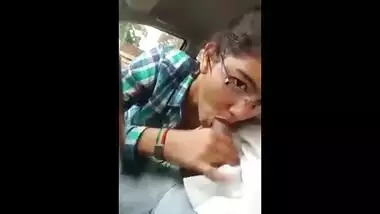 Indian porn mms of a slutty teen giving a blowjob to lover in his car