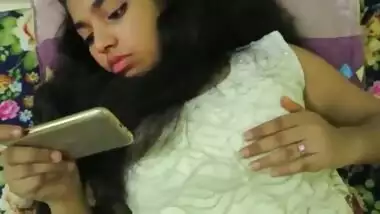 Horny girl watching a hot desi porn