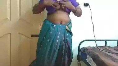 desi indian tamil telugu kannada malayalam hindi horny cheating wife vanitha wearing blue colour saree showing big boobs and shaved pussy press hard b