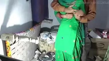 Lewd Desi mom in green saree fucked by shopkeeper in village store pantry