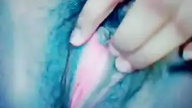 Desi girl shows off and rubs her hairy XXX sex hole in solo porn