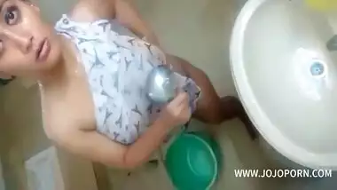 Desi Chick Bathing