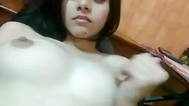 Desi girl playing with her boobs