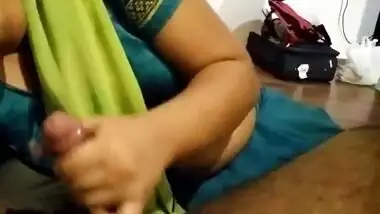 Clothed Desi woman strokes sex partner's XXX stick with the left hand