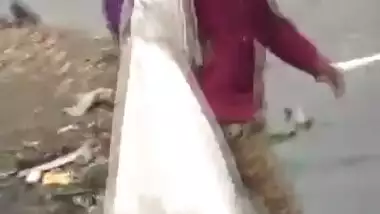 Bengali desi aunty washing mature ass in Public 