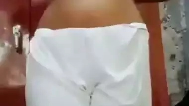 Desi nude Bangla girl strips and shoots her nude MMS