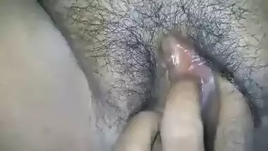 Desi indian milf with hairy pussy being fingered on clit