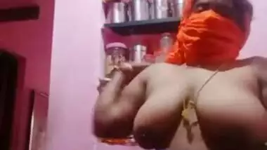 Busty Desi mom takes clothes off to expose her smokin' hot body