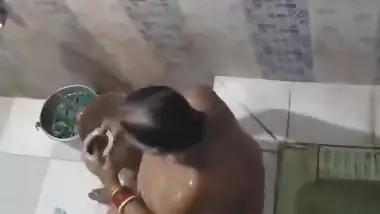Desi Bhabhi Bathing record By hidden cam