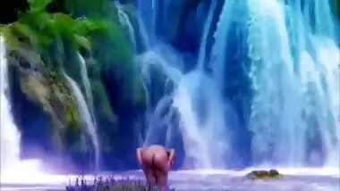 Desi publicly nude in front of water fall.