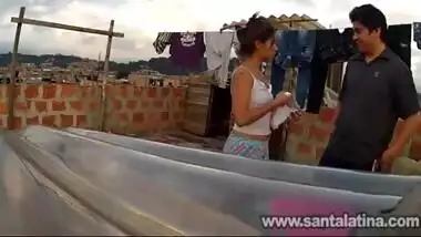 Young couple enjoy a sneaky outdoor sex on their rooftop