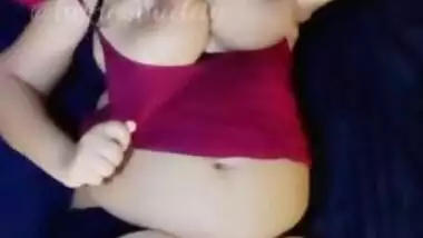 Desi Bhabhi playing with Dildo in Sexy Pose and Showing Pussy and Tits