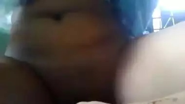 horny girl fingering her sahved pussy