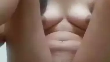 Desi slut takes panties off to finger her XXX cunt in the bathroom
