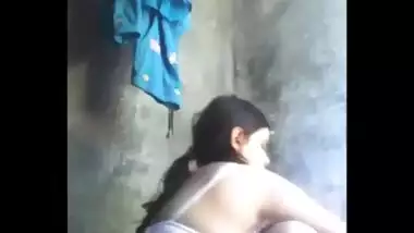 Sexy village woman bathing for her husband