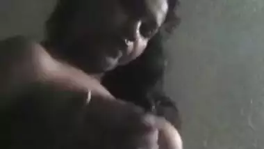 Desi chick takes clothes off revealing XXX sized boobies on camera