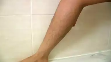Sexy Babe exposes hairy pussy and Pees in the Bathtub