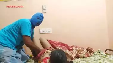 Stallion in a blue mask sets camera to film sex with Desi XXX partner