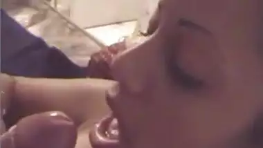 Indian chick jerks a whole load of cum in her mouth