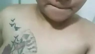 Busty tattoed Tamil GF nude MMS