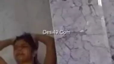Indian pervert secretly films the landlady taking a shower