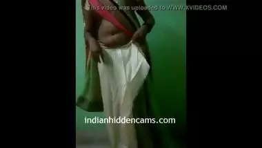 Indian Bhabhi In Sari Stripping Naked - IndianHiddenCams.com