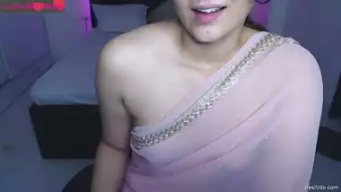 Hot cousin in transparent saree showing her milky white boobs and talking dirty