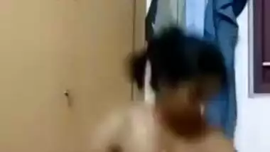 Indian girl doesn't know what to wear and flashes body parts in homemade porn