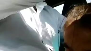 Desi girl giving blowjob inside running car